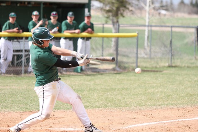 Photo by Chad Koenen
Asher Blaine rips a bas hit during a Frazee regular season game.